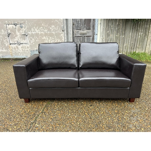 8 - As new ex shop display brown leather effect 2 seater sofa, 175 wide