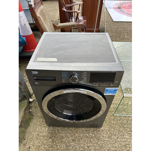 82 - A grey beko washer drier