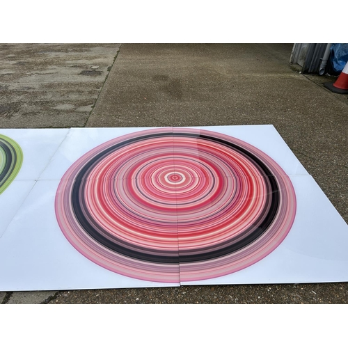 87 - A very large Perspex modern wall art of a red and black circle, made up of four Perspex panels total... 