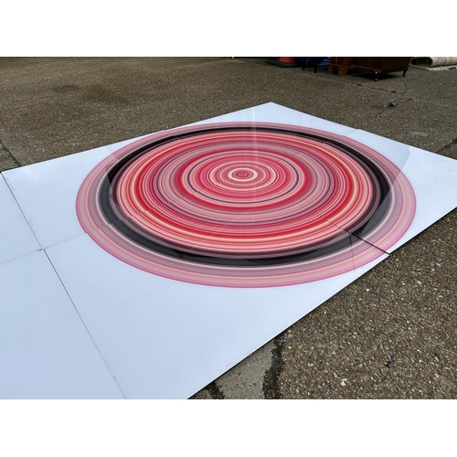 87 - A very large Perspex modern wall art of a red and black circle, made up of four Perspex panels total... 