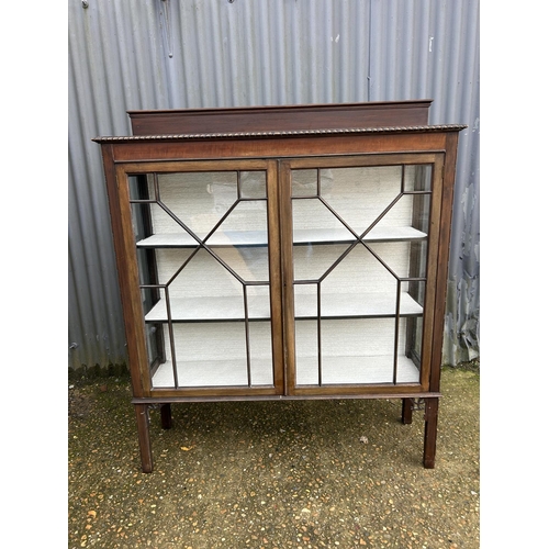 90 - Glazed mahogany two door cabinet 120x36x115