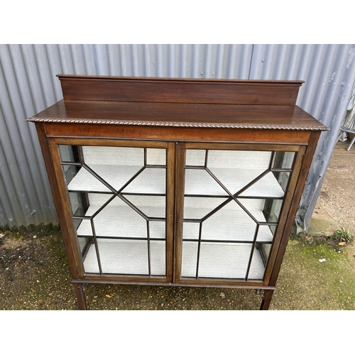 90 - Glazed mahogany two door cabinet 120x36x115