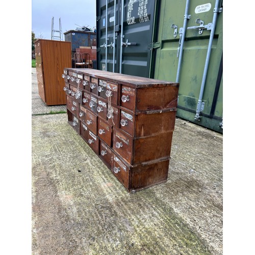 81A - A bank of vintage haberdashery drawers 145cm wide