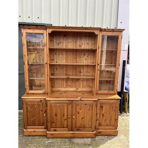 200I - A modern ducal pine break front bookcase 174x40x190