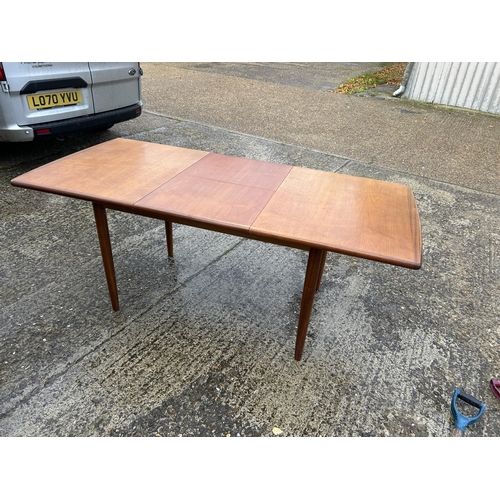 109 - A meredew teak extending dining table with leaf  max size 180x82x70