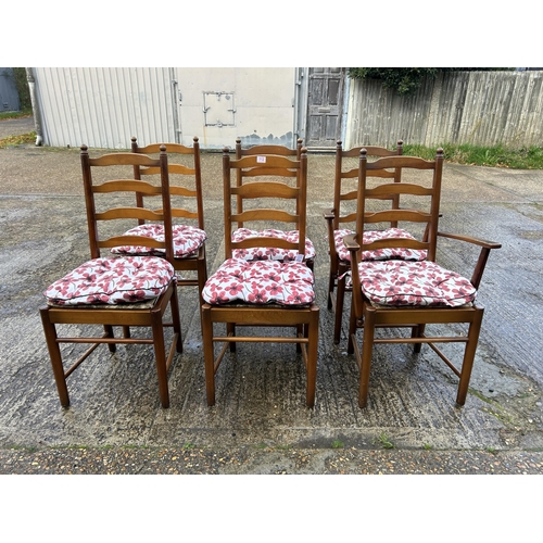 112 - A set of six dark ercol ladder back dining chairs