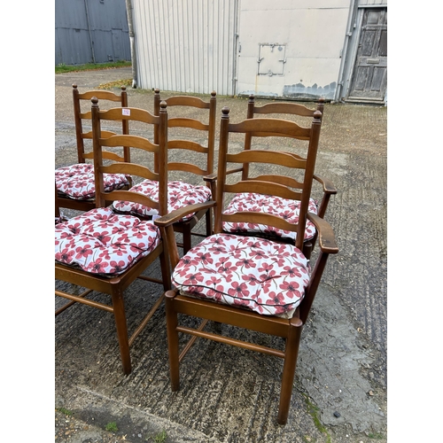 112 - A set of six dark ercol ladder back dining chairs