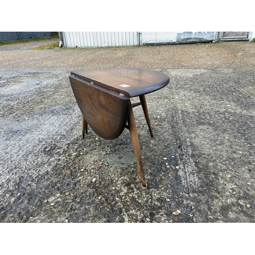 113 - A dark ercol drop leaf coffee table