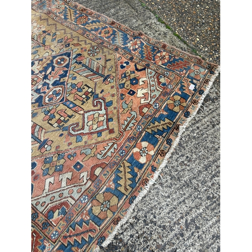 120 - A worn blue and oriental rug 240x110