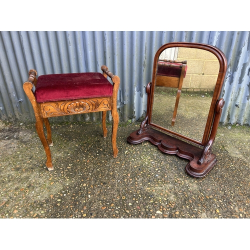 121 - A Victorian mahogany swing mirror together with Edwardian piano stool