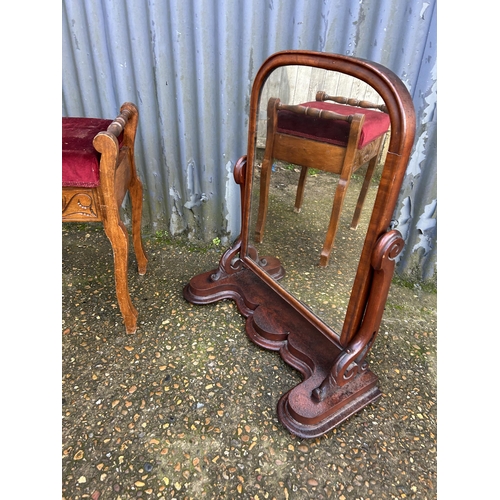 121 - A Victorian mahogany swing mirror together with Edwardian piano stool