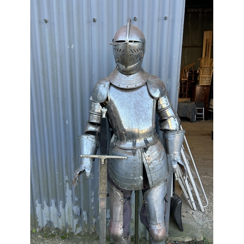 127 - A wearable full suit of armour with sword set on mannequin stand