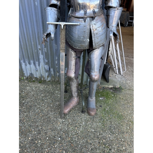 127 - A wearable full suit of armour with sword set on mannequin stand