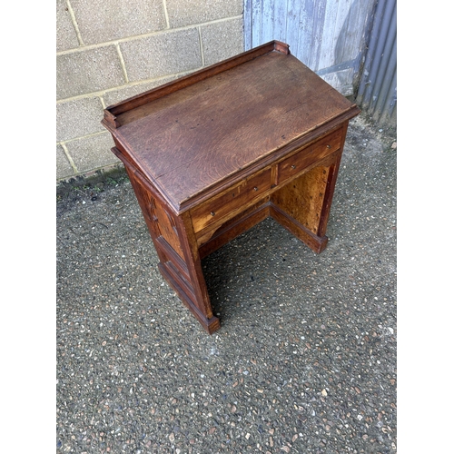 134 - An oak church lectern with two pull out book slides 76x47x90