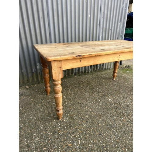 140 - A solid pine dining table 152x72x75