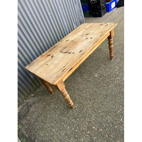 140 - A solid pine dining table 152x72x75