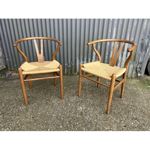 158 - A pair of bow back dining chairs