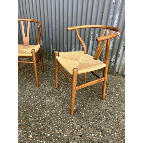 158 - A pair of bow back dining chairs