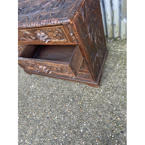 162 - A carved oak chest of drawers 108x50x80