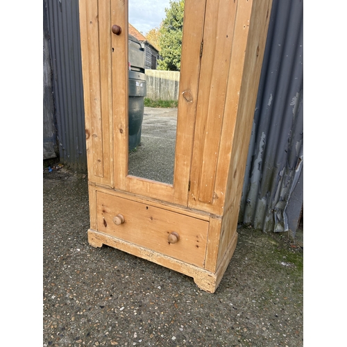 165 - A pine single door wardrobe 93x50 x200