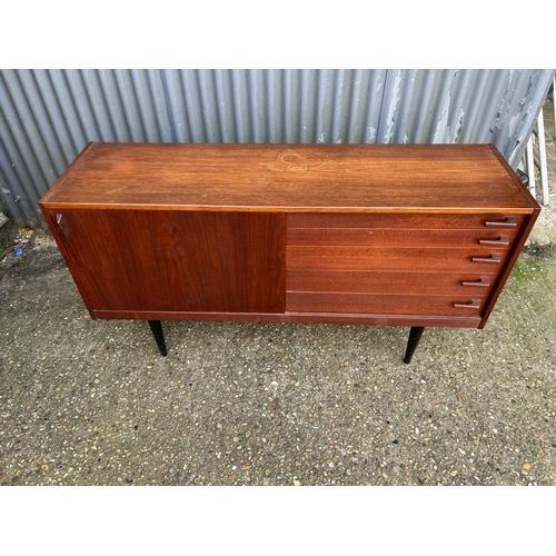 167 - A mid century danish sideboard labelled HUGO TROEADS  150x40x80