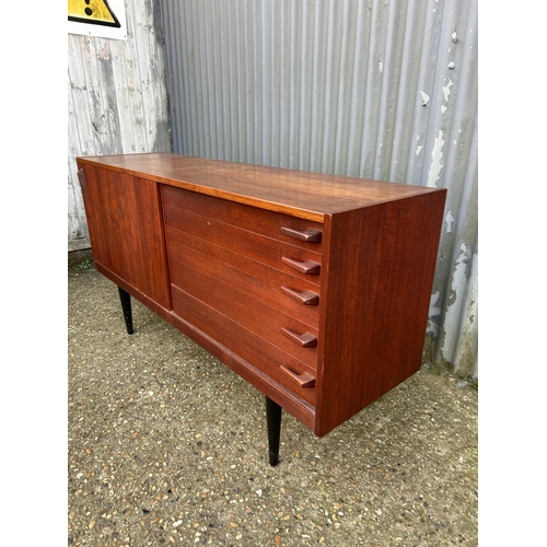 167 - A mid century danish sideboard labelled HUGO TROEADS  150x40x80