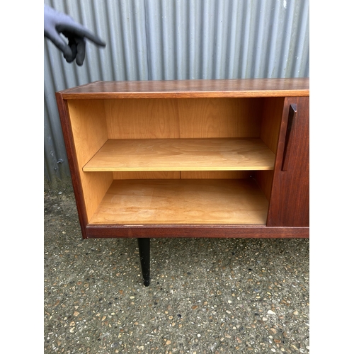 167 - A mid century danish sideboard labelled HUGO TROEADS  150x40x80