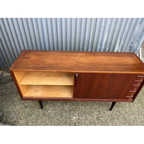 167 - A mid century danish sideboard labelled HUGO TROEADS  150x40x80