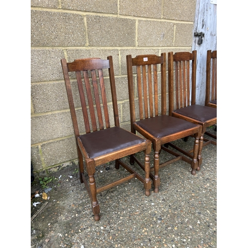 169 - A set of four 1920's oak dining chairs