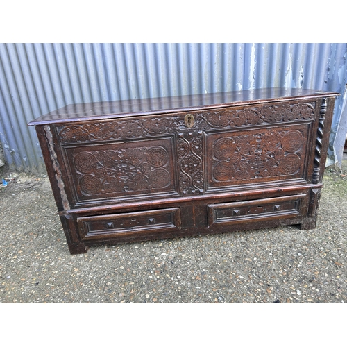 17 - A carved oak mule chest 128x57x57