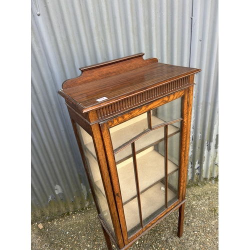 172 - An oak single door cabinet