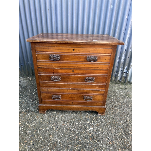 18 - A satinwood chest of three drawers 82x52x82