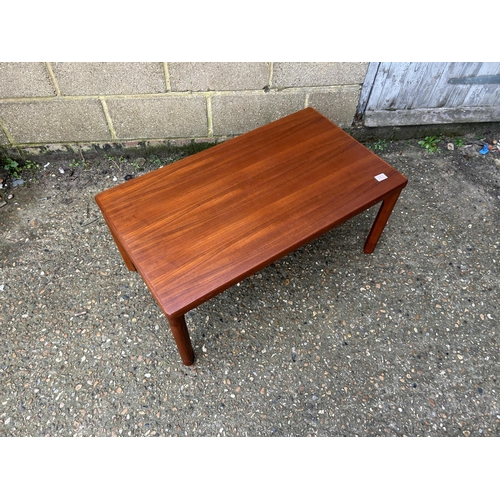 181 - A danish teak coffee table stamped to the underside 94x53 x40