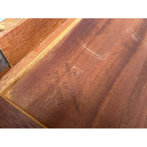 181 - A danish teak coffee table stamped to the underside 94x53 x40