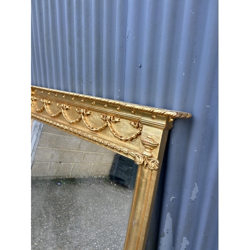 188 - A large gold gilt overmantle mirror 130x130