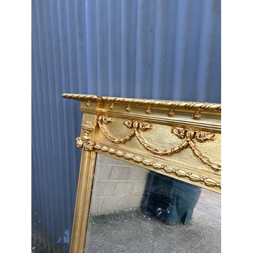 188 - A large gold gilt overmantle mirror 130x130