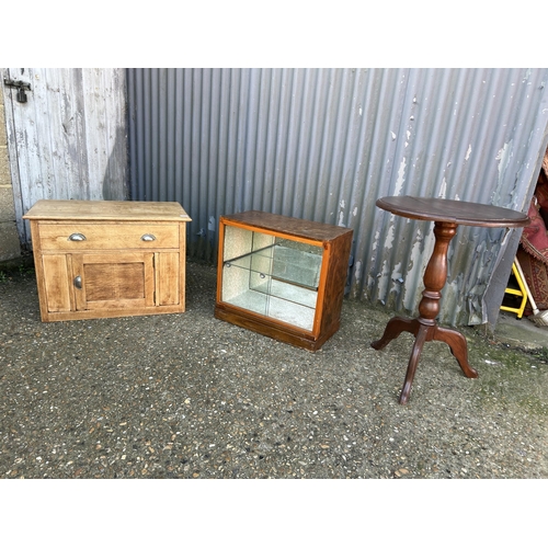 20 - Oak single drawer unit, glazed cabinet and a tripod table