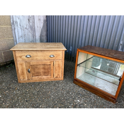 20 - Oak single drawer unit, glazed cabinet and a tripod table