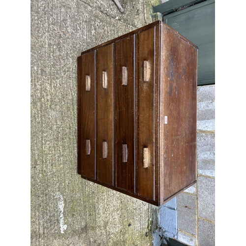 228 - A retro ply chest of four 90x46x75