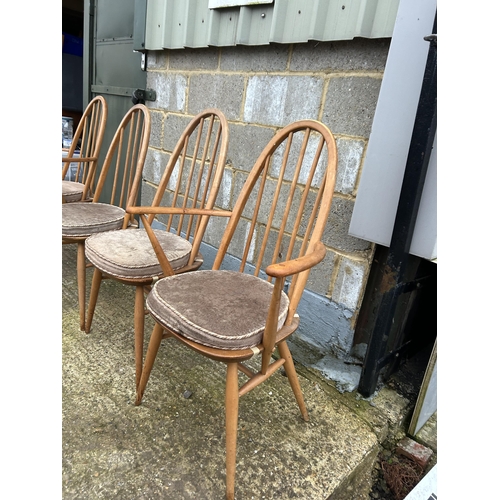 247 - A set of four ercol light elm stick back dining chairs (inc 2 carvers)