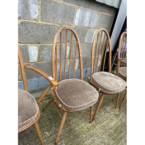 247 - A set of four ercol light elm stick back dining chairs (inc 2 carvers)