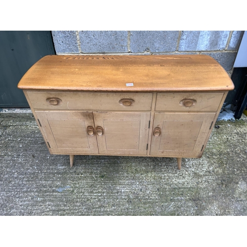 249 - An ercol light elm sideboard 122x46x82