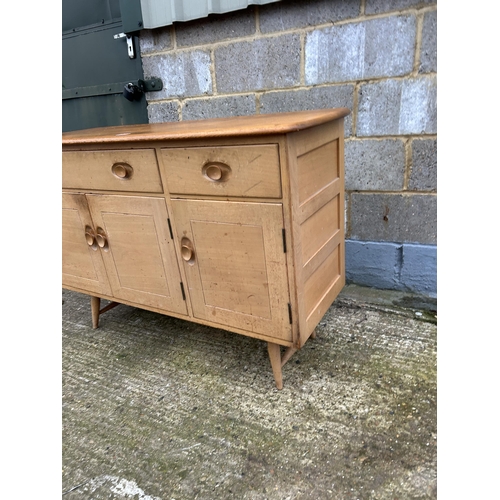 249 - An ercol light elm sideboard 122x46x82