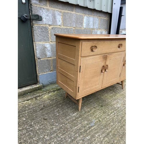 249 - An ercol light elm sideboard 122x46x82