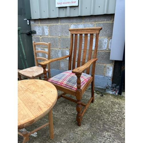 258 - Oak carver, pine chair, two plant stands, three  pine tables and magazine rack