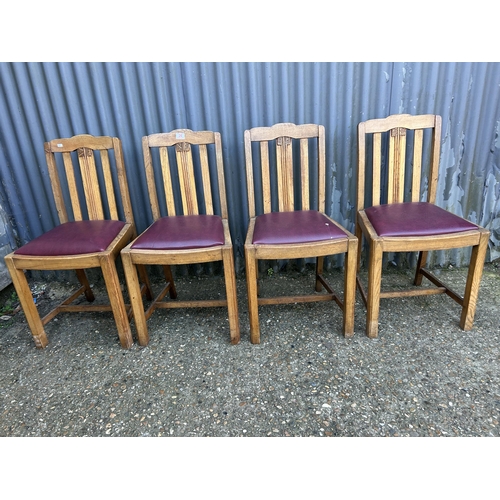 26 - A set of four 1920's oak dining  chairs