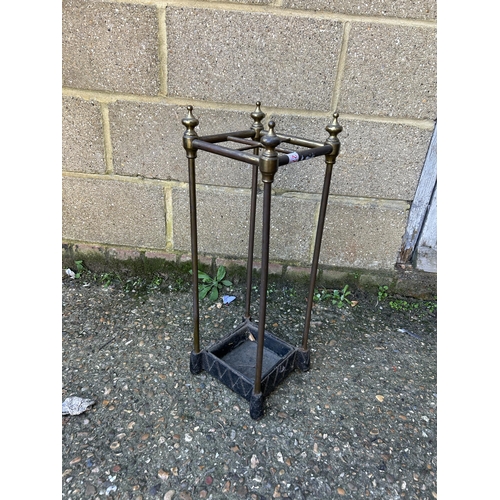 27 - A brass and iron stick stick stand