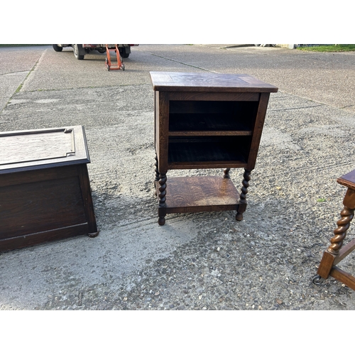 29 - A collection of small oak furniture including blanket box, two drawer table, open shelf and two occa... 