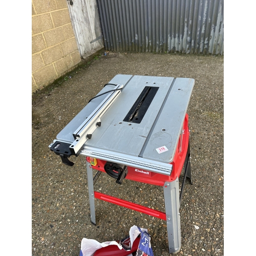 316 - An EINHELL table saw with bag of attachments