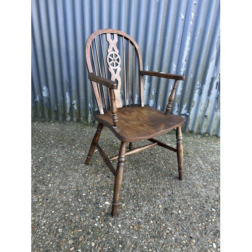 36 - A wheelback carver chair